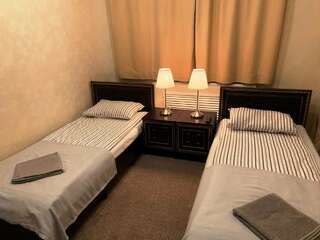 Гостиница Майкоп Сити Майкоп Двухместный номер с 2 отдельными кроватями и собственной ванной комнатой-9